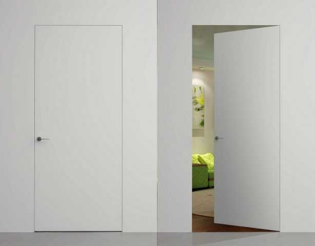 Двери без наличников еще называют скрытыми дверями - их отличает отсутствие видимой дверной коробки, а иногда и ручки.
